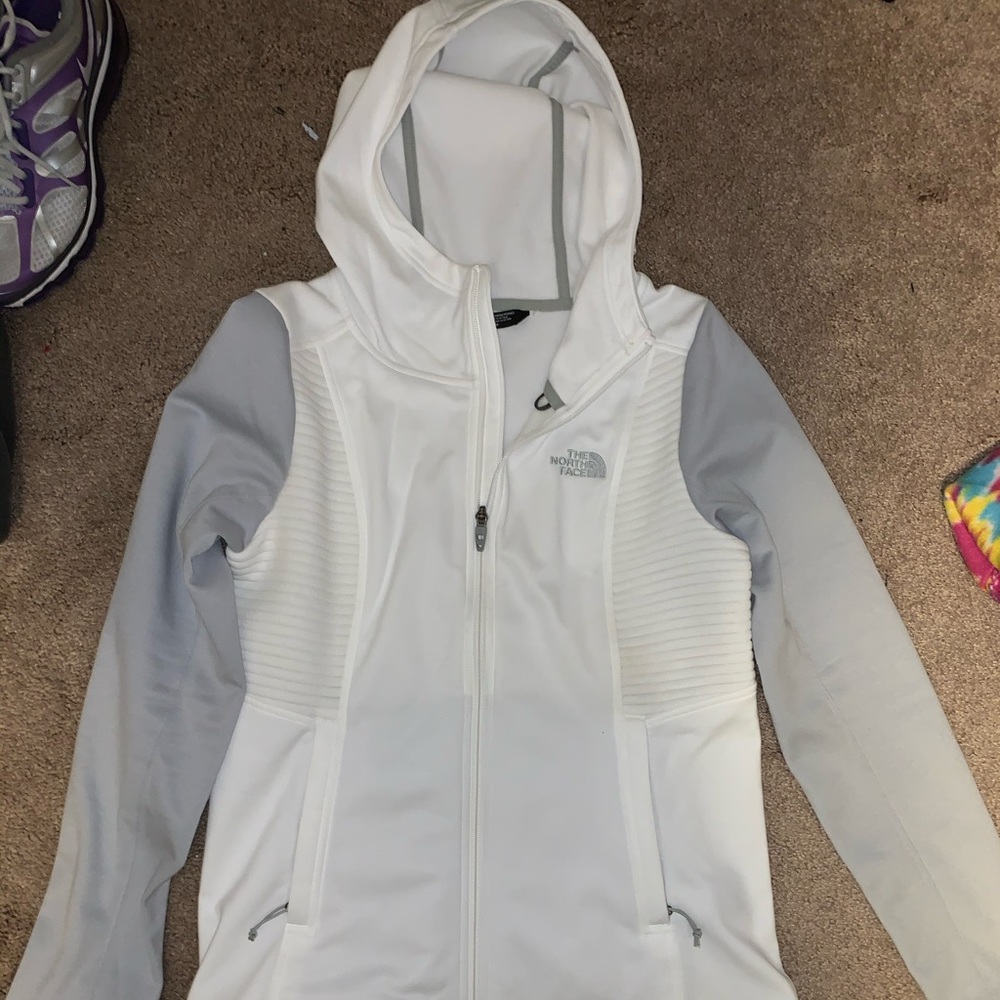 White and gray Northface jacket